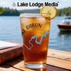 Glass of iced tea with "Lake Rabun" map design and lemon slice.