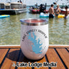 White insulated wine tumbler featuring a Lake Stanley Draper, Oklahoma graphic sits on a wooden dock with people enjoying a lake in the background.