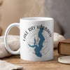 White mug with Lake Ray Hubbard map, compass, and Texas text.