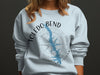 Light blue sweatshirt with Toledo Bend, Louisiana map, compass, and text.