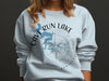 Light blue sweatshirt with "Cave Run Lake Kentucky" and compass map design.