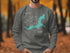 Gray sweatshirt with "Beautiful Lake Jackson Georgia" text and compass rose graphic.