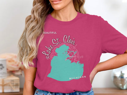Woman wearing a pink t-shirt with Lake St. Clair Michigan graphic.