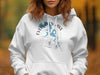 White hoodie with "EVERGREEN LAKE ILLINOIS" and a compass design featuring a blue lake map.