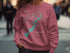 Pink sweatshirt with "Tenkiller Ferry Lake Oklahoma" and compass graphic.