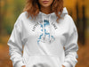 White hoodie with Little Grass Lake, Illinois map and compass design.