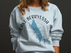 Light blue sweatshirt with Lake Berryessa, California map and compass design.