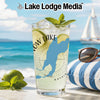 Glass with "Now Lake" and Washington state outline on beach background.