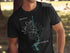 Black t-shirt with "Beautiful Lake Oahe, North Dakota" text and compass graphic.