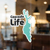 Cascade Life sticker with a turquoise outline of a geographical shape.