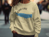 Cream sweatshirt with Oneida Lake map, compass, and "New York" text.