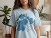 Light blue t-shirt with Floyd Lake Minnesota graphic and compass design