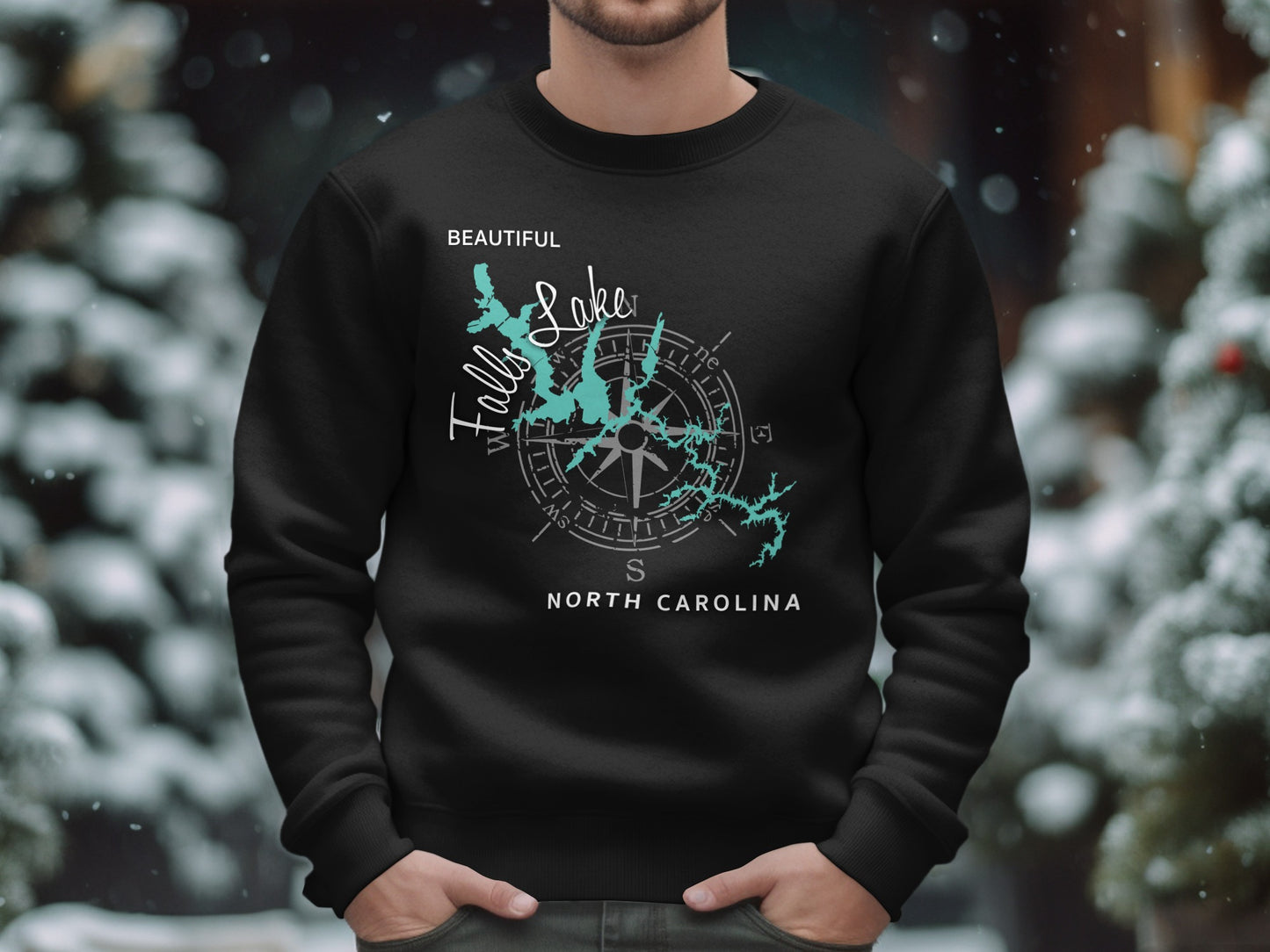 Black sweatshirt with a teal map and compass design for Falls Lake, North Carolina.