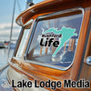 Turquoise Michigan outline sticker with "Rushford Life" text on a boat window.