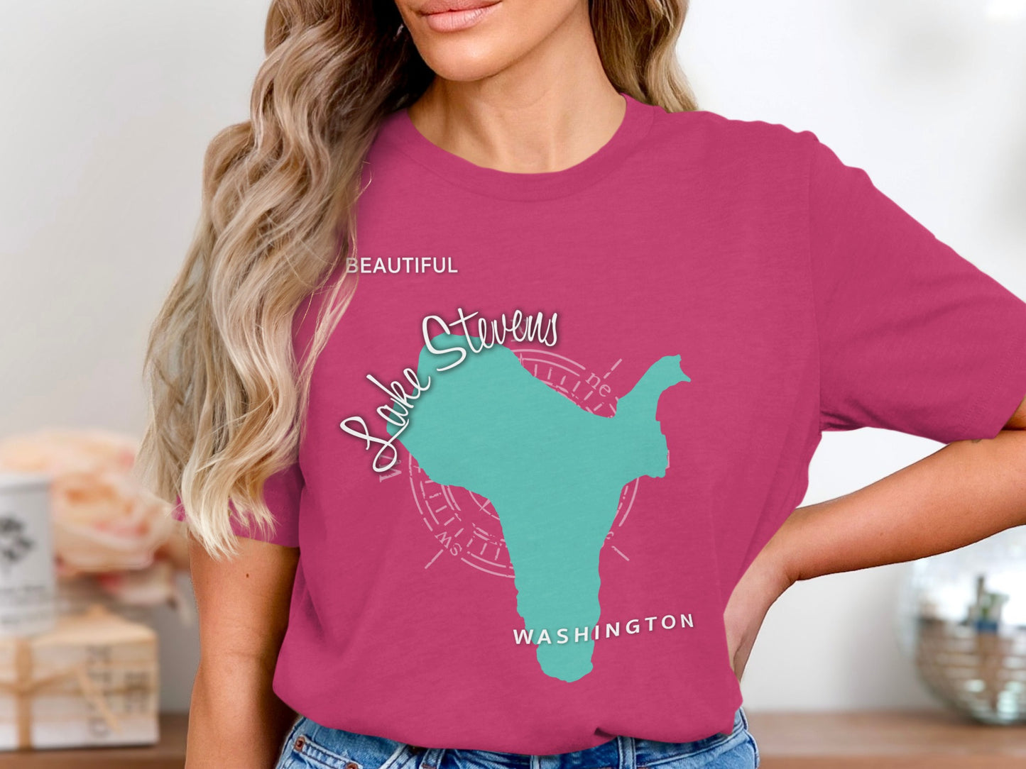 Pink t-shirt with map of Lake Stevens, Washington and compass rose graphic.