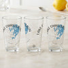 Three clear glasses with blue Lake Charleston map and compass design.