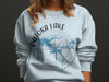 Patoka Lake Indiana graphic on a light blue sweatshirt with compass and map design.