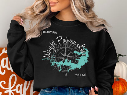 Black sweatshirt featuring a compass rose graphic and "Beautiful Wright Patman Lake Texas" text.