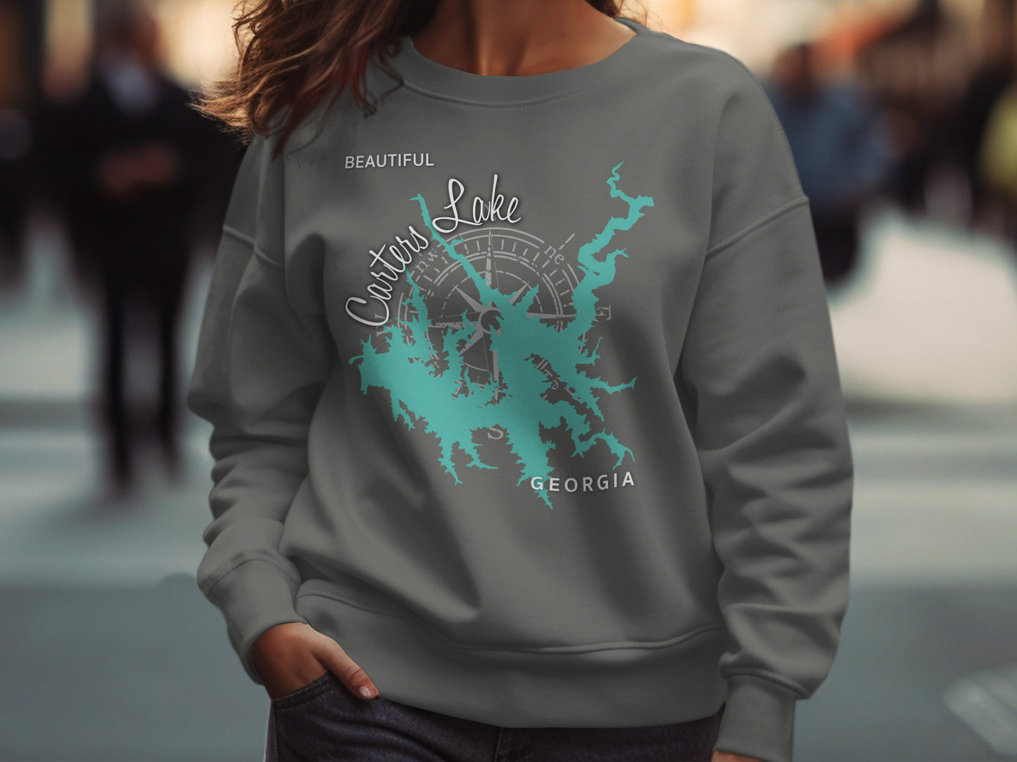 Carter's Lake Georgia map design on a grey crewneck sweatshirt.