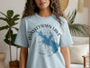 Light blue t-shirt featuring "Whiskeytown Lake California" text with a lake map and compass design.