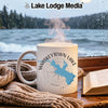 White mug with "Whiskeytown Lake California" graphic steaming on a windowsill.