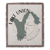 Woven blanket with Lake Union shape, compass rose, and Washington text.