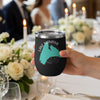 Black tumbler with teal map of Lake Manawa and compass rose.