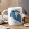 White mug with blue Lake Almanor California map design and compass graphic.