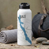 White water bottle with blue lake map graphic and compass rose design.