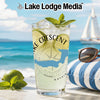 Glass with Lake Crescent and Washington design on beach background.