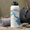 White water bottle with black lid, displaying "LIVINGSTON" above a blue map outline and compass.