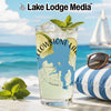 Glass with Yellowstone Lake outline, mint, lime, ice, and "WYOM" text.