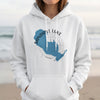 White hoodie with Sandhill Lake Wisconsin graphic and compass rose detail.