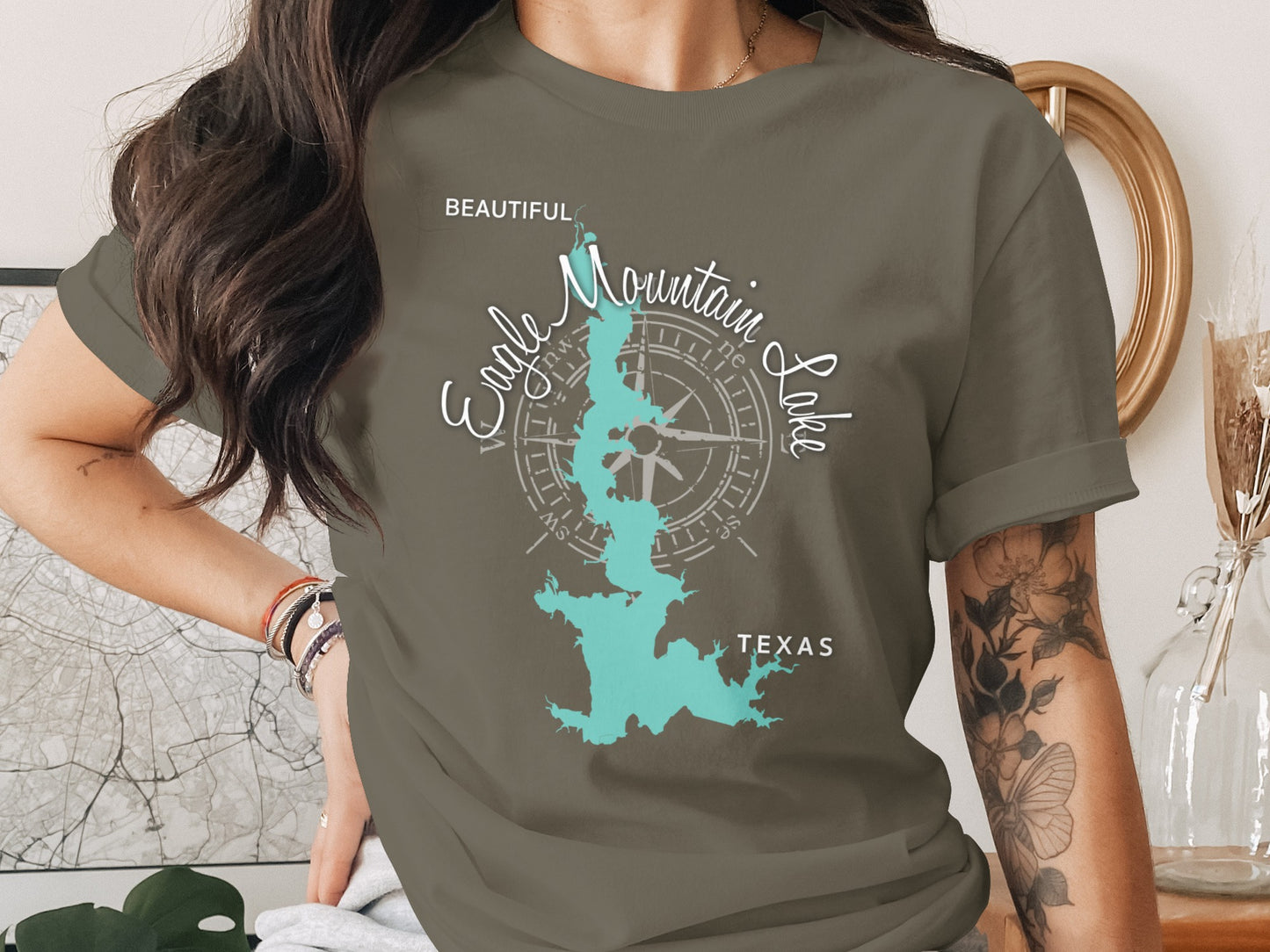 Teal Eagle Mountain Lake Texas map with compass on gray t-shirt.