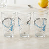 Three clear glasses with blue Lake Hartwell map and compass designs.