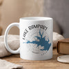 White mug with Lake Rampart Colorado map and compass design.