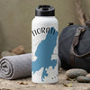 White water bottle with Tiorati map graphic and compass rose, next to rolled towel.