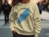 Light yellow sweatshirt with "Rattlesnake Lake Washington" and blue lake graphic.