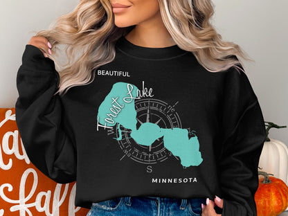 Black sweatshirt with "Beautiful Forest Lake" text and Minnesota map graphic.