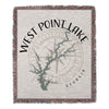 Woven blanket with "West Point Lake Georgia" text, a compass, and lake outline.