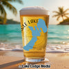 Glass of beer on beach with "Eagle Lake" and California map graphic.