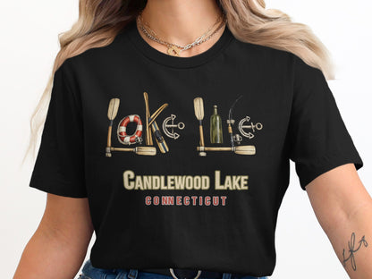 T-shirt with lake life graphics, including oars, anchor, life preserver, and bottle.
