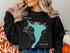 Black Canyon Lake Arizona compass graphic on a black sweatshirt.