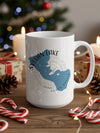 White mug with Sylvan Lake, South Dakota map and compass design.