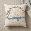 Pillow with Lake Ossawinnnamakee map and compass design in blue and grey.