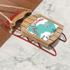 Wooden sled ornament with red runners and rope, "Merry Christmas FROM Lake Calhoun" text.