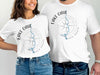 White t-shirts with "LAKE OAHE NORTH DAKOTA" text and compass graphic.