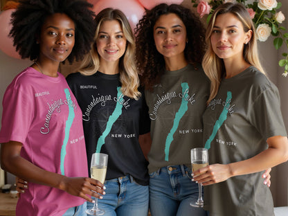 Four women in t-shirts with "Canandaigua Lake" and "New York" text.