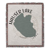Hauser Lake Idaho map design on a fringed woven throw blanket.