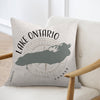 Pillow with Lake Ontario map outline and compass rose design.